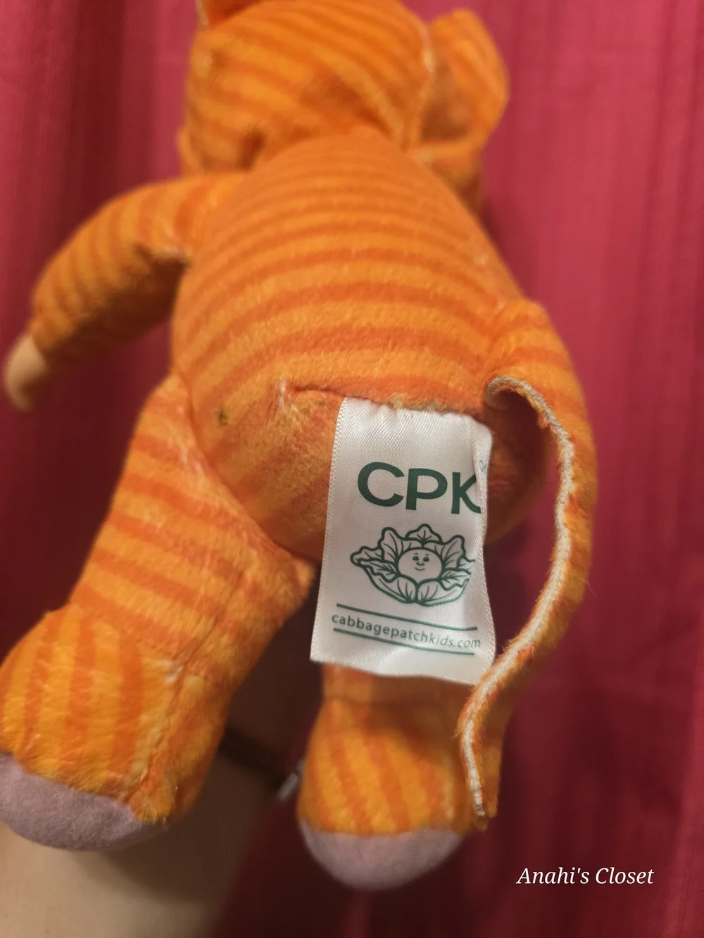 Orange Cat Plush Baby Doll with Yellow Belly and Blue Bow